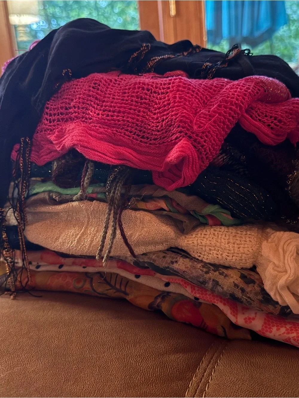12 scarfs. All different styles and colors. Selling in a lot. All for